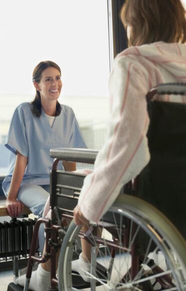 Nurse taking care of a patient as a home care assistance in Hillsborough County